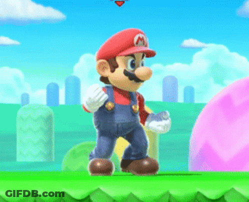 A Mario Video Game Character Is Standing On A Green Hill GIF