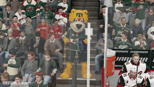 A Mascot For The Minnesota Wild Is Standing In Front Of A Crowd GIF