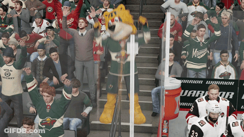 A Mascot For The Minnesota Wild Stands In Front Of A Crowd Of Fans GIF