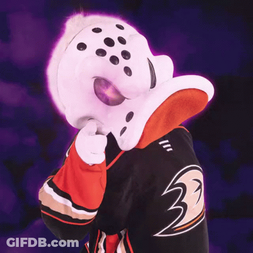 A Mascot Is Pointing At The Camera With The Words Supreme Victory Above Him GIF