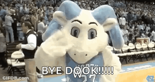 A Mascot Is Standing On A Basketball Court With The Words `` Bye Dook '' Written On It . GIF