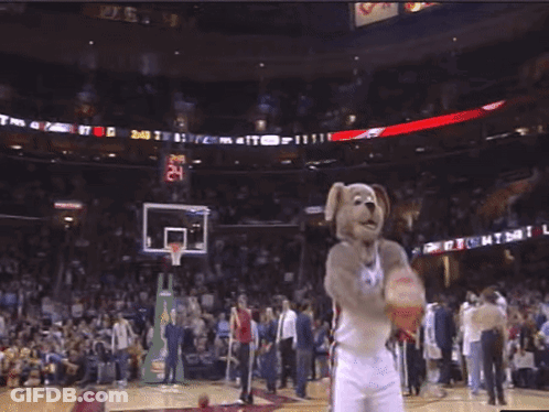 A Mascot On A Basketball Court Wearing A Jersey With The Letter C On The Back GIF