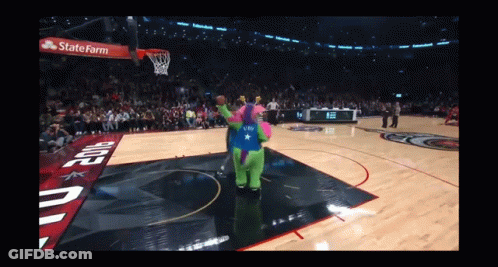 A Mascot On A Basketball Court With A State Farm Ad GIF