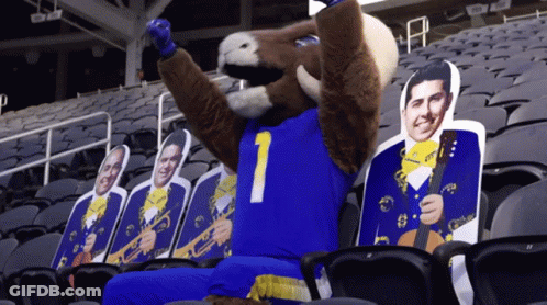A Mascot Wearing A Blue Jersey With The Number 1 GIF