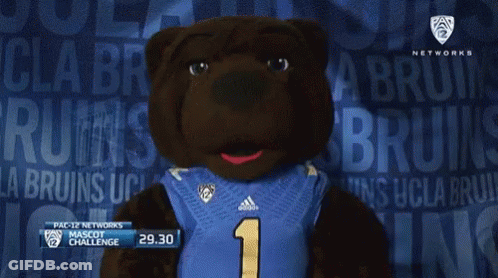 A Mascot Wearing A Blue Jersey With The Number 1 GIF