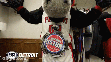 A Mascot Wearing A Detroit Pistons Jersey GIF