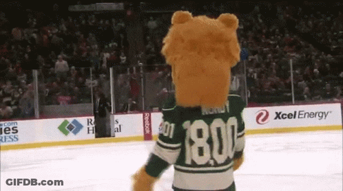 A Mascot Wearing A Green Jersey With The Number 1800 GIF