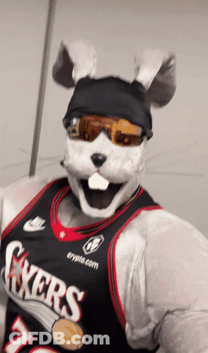 A Mascot Wearing A Jersey That Says Sixers GIF
