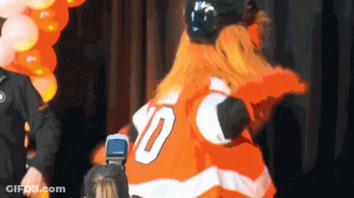 A Mascot Wearing A Jersey With The Number 10 GIF