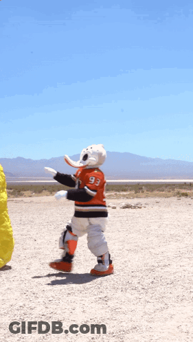 A Mascot Wearing A Jersey With The Number 99 GIF