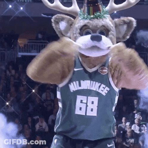 A Mascot Wearing A Milwaukee Jersey With The Number 68 GIF