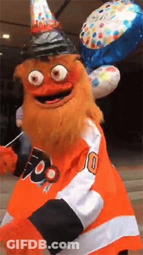 A Mascot Wearing A Number 10 Jersey Is Holding Balloons GIF