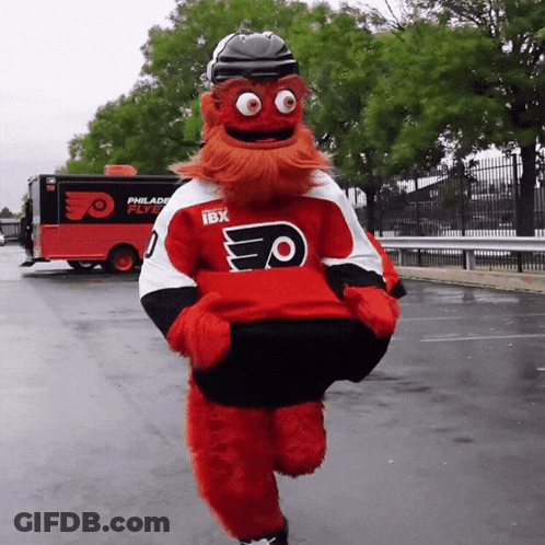A Mascot Wearing A Philadelphia Flyers Jersey Is Running GIF