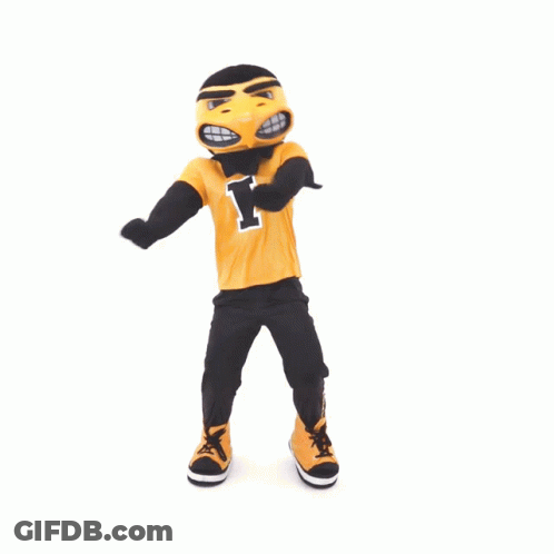 A Mascot Wearing A Yellow Shirt With The Letter L On It GIF