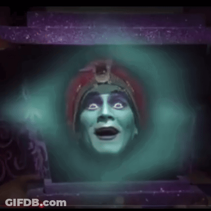 A Mask With A Ring Around It And A Crown On It GIF
