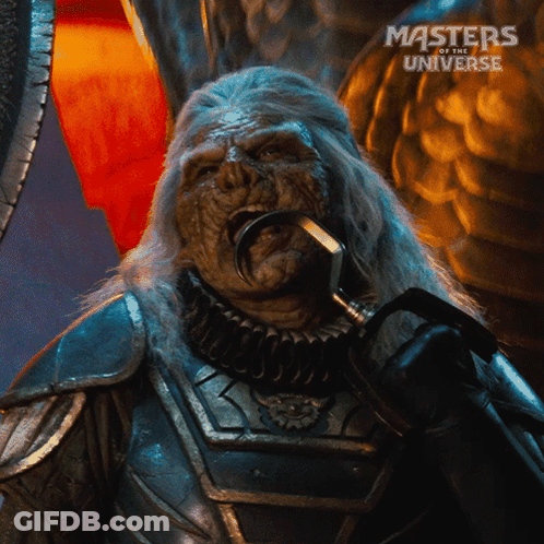 A Masters Of The Universe Poster With A Monster GIF