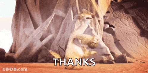 A Meerkat Is Standing In Front Of A Rock Formation With The Words Thanks Written Above It . GIF