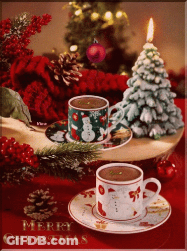 A Merry Christmas Card With Two Cups Of Coffee And A Christmas Tree GIF