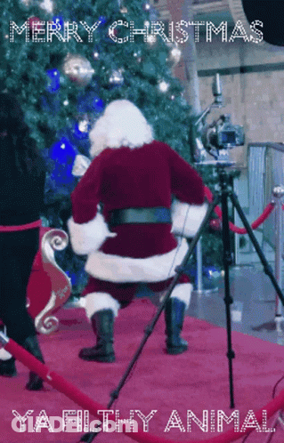 A Merry Christmas Greeting Card With Santa Dancing On The Red Carpet GIF