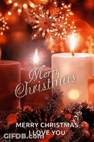 A Merry Christmas Greeting Card With Two Lit Candles And Pine Cones GIF