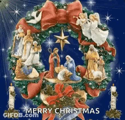 A Merry Christmas Wreath With A Nativity Scene In It GIF