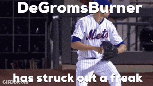 A Mets Baseball Player Is Getting Ready To Pitch The Ball GIF
