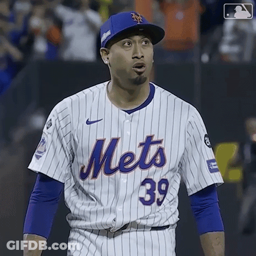 A Mets Baseball Player Wearing A Blue Hat And Jersey Number 39 GIF