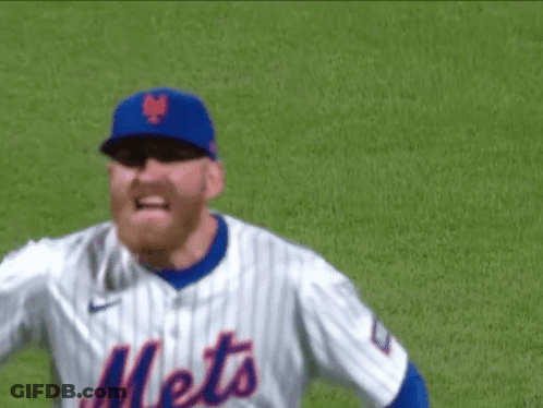 A Mets Baseball Player Wearing A Blue Hat And Striped Shirt GIF