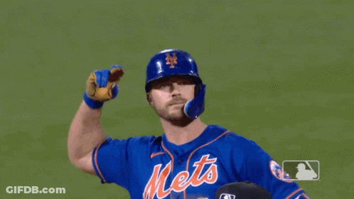 A Mets Baseball Player Wearing A Blue Jersey With The Number 20 GIF