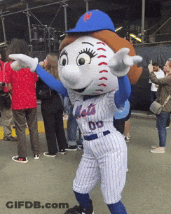 A Mets Mascot Is Standing In Front Of A Crowd Of People GIF