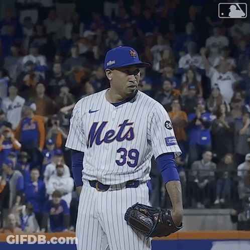 A Mets Pitcher Wearing Number 39 Stands On The Field GIF
