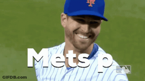 A Mets Player Is Smiling And Wearing A Blue Cap GIF