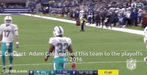 A Miami Dolphins Football Player Wearing Number 32 Runs On The Field GIF