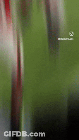 A Miami Hurricanes Advertisement With A Blurry Background GIF
