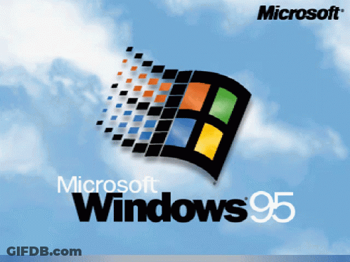 A Microsoft Windows 95 Logo Against A Blue Sky With Clouds GIF
