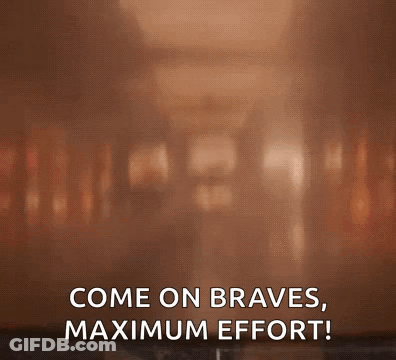 A Microwave Oven With The Words Come On Braves Maximum Effort Written On It GIF