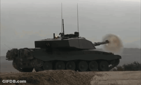 A Military Tank With The Number 14 On It GIF