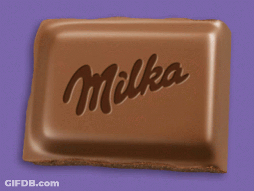 A Milka Chocolate Bar Is Against A Purple Background GIF
