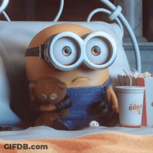 A Minion Holding A Teddy Bear Next To A Cup That Says Soda On It GIF