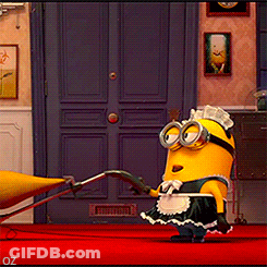 A Minion In A Maid Outfit Is Standing On A Red Carpet In Front Of A Blue Door GIF
