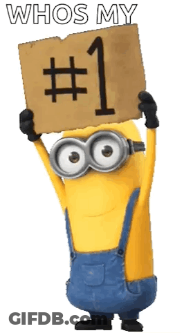 A Minion Is Holding A Sign That Says `` Whos My # 1 '' . GIF