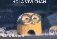 A Minion Wearing Goggles And A Surprised Look On His Face Is Standing In The Rain . GIF