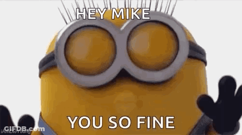 A Minion Wearing Goggles And Gloves Is Saying `` Hey Mike , You So Fine '' . GIF