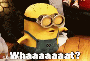 A Minion Wearing Goggles And Overalls Says Whaaaaat GIF