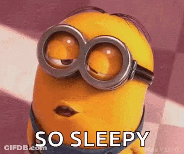 A Minion Wearing Goggles Is Saying `` So Sleepy '' With His Eyes Closed . GIF