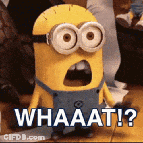 A Minion With A Surprised Look On His Face And The Words Whaaat Written Below Him GIF
