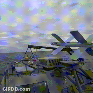 A Missile Is Being Launched From A Military Ship GIF