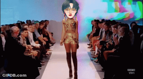 A Model Walks Down The Runway At A Fashion Show On Vh1 GIF