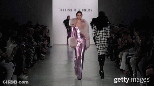 A Model Walks Down The Runway At A Turkish Designers Show GIF