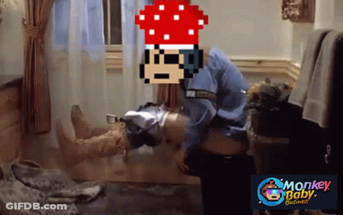 A Monkey Baby Business Advertisement With A Pixelated Image Of A Man GIF